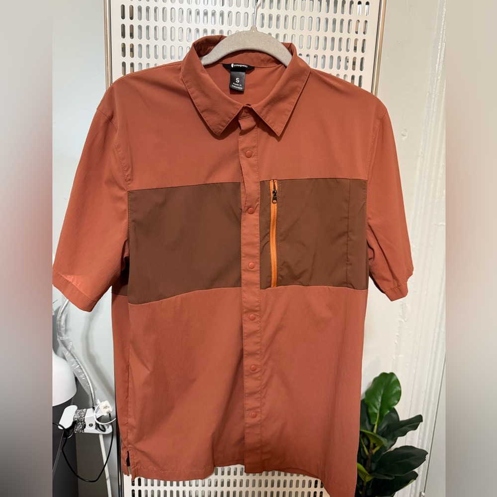 cotopaxi Short-Sleeve Button-Down in Rust and Brown with Orange Zip